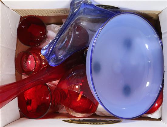 A group of assorted coloured glassware